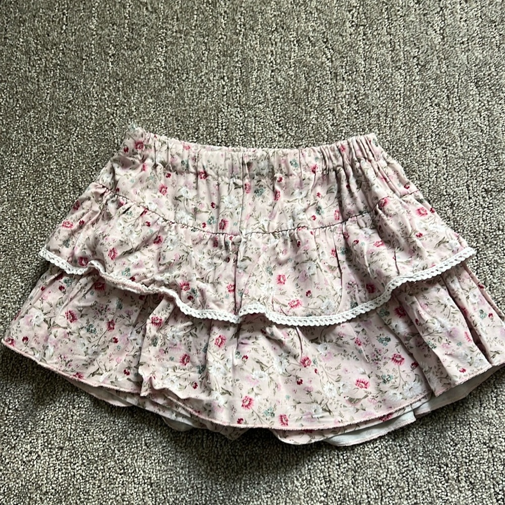 Phi skort. Decorative bow in back. Cotton. Made in Portugal - adjustable waist .
